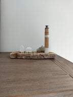 Phare et petit port en bois flotté
